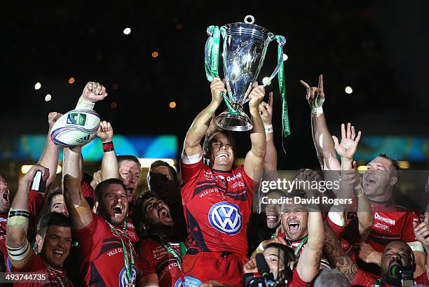 Jonny Wilkinson the Toulon captain, raises the Heineken Cup as his team mates celebrate after their victory during the Heineken Cup Final between...