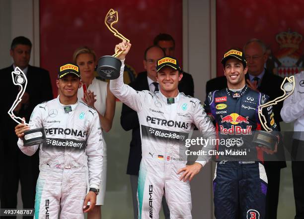 Lewis Hamilton of Great Britain and Mercedes GP, Nico Rosberg of Germany and Mercedes GP and Daniel Ricciardo of Australia and Infiniti Red Bull...