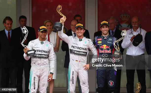 Lewis Hamilton of Great Britain and Mercedes GP, Nico Rosberg of Germany and Mercedes GP and Daniel Ricciardo of Australia and Infiniti Red Bull...