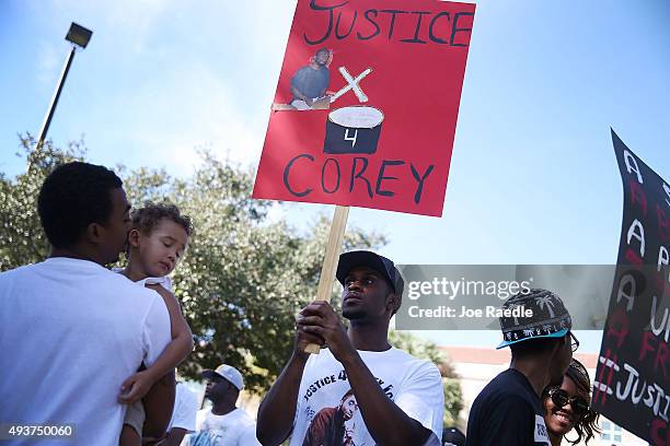 People attend a rally as they seek answers to why Corey Jones was shot and killed by an off duty police officer on October 22, 2015 in West Palm...