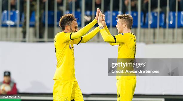 Pierre-Emerick Aubameyang of Borussia Dortmund celebrates scoring the opening goal together with his team mate Marco Reus during the UEFA Europa...
