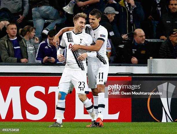 Christian Eriksen of Spurs is congratulated by Erik Lamela of Spurs after scoring the opening goal during the UEFA Europa League Group J match...