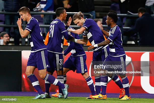 Guillaume Gillet of Anderlecht celebrates with teammates after scoring a goal to level the scores at 1-1 during the UEFA Europa League Group J match...