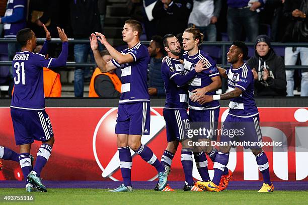 Guillaume Gillet of Anderlecht celebrates with teammates after scoring a goal to level the scores at 1-1 during the UEFA Europa League Group J match...