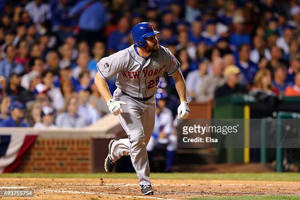 Daniel Murphy of the New York Mets hits a a double in the seventh inning against the Chicago Cubs during game four of the 2015 MLB National League...
