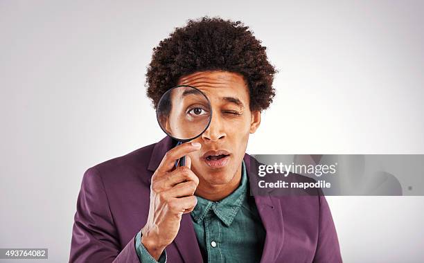 you see but you don't observe - magnifying glass black man stock pictures, royalty-free photos & images