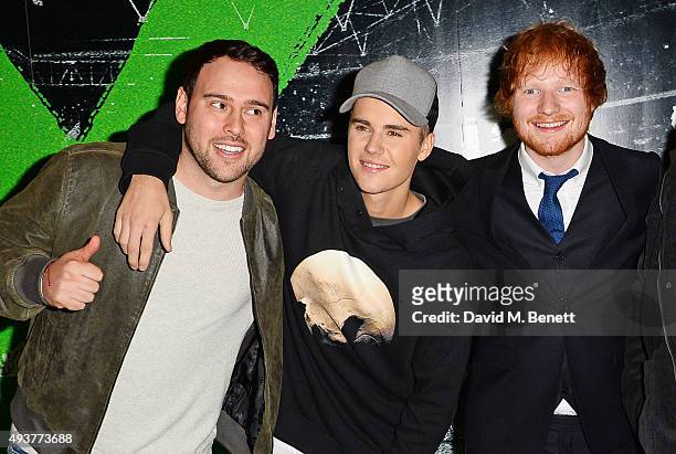 Scooter Braun, Justin Bieber and Ed Sheeran attend the World Premiere of "Ed Sheeran: Jumpers For Goalposts" at Odeon Leicester Square on October 22,...