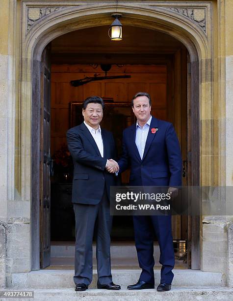 British Prime Minister David Cameron welcomes Chinese President Xi Jinping to his official residence at Chequers on October 22, 2015 in Aylesbury,...