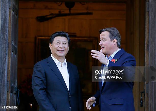 British Prime Minister David Cameron welcomes Chinese President Xi Jinping to his official residence at Chequers on October 22, 2015 in Aylesbury,...