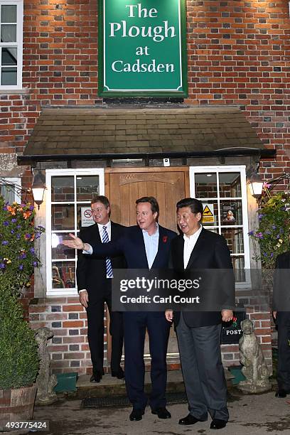 Prime Minister David Cameron leaves The Plough pub with China's president Xi Jinping on October 22, 2015 in Princes Risborough, England. The...