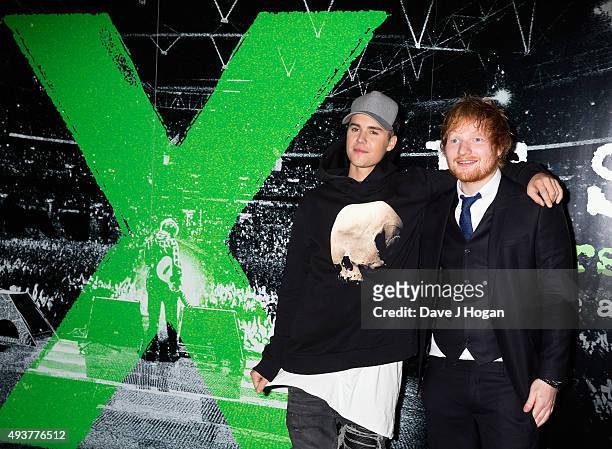 Justin Bieber poses with Ed Sheeran at the World Premiere of "Jumpers For Goalposts" at Odeon Leicester Square on October 22, 2015 in London, England.