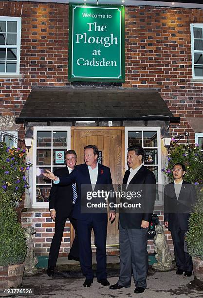 Prime Minister David Cameron leaves The Plough pub with China's president Xi Jinping on October 22, 2015 in Princes Risborough, England. The...