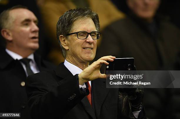 Liverpool owner John W. Henry looks on during the UEFA Europa League Group B match between Liverpool FC and Rubin Kazan at Anfield on October 22,...