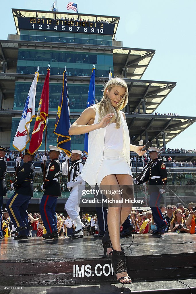 LeAnn Rimes exits the stage after singing the National Anthem at the