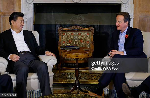 British Prime Minister David Cameron holds talks with Chinese President Xi Jinping at his official residence at Chequers on October 22, 2015 in...