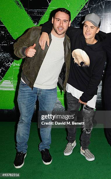 Scooter Braun and Justin Bieber attend the World Premiere of "Ed Sheeran: Jumpers For Goalposts" at Odeon Leicester Square on October 22, 2015 in...