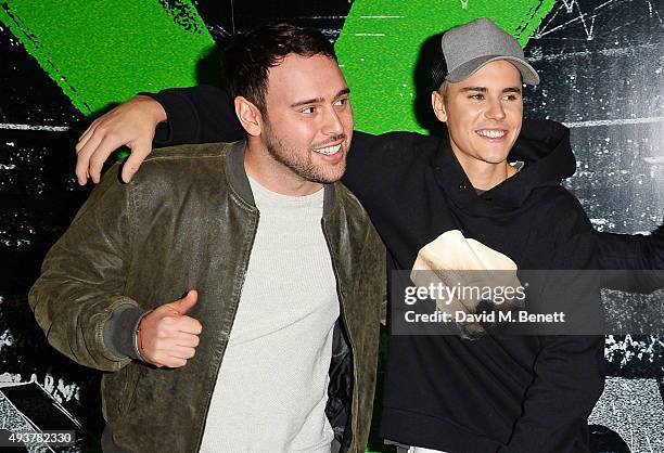 Scooter Braun and Justin Bieber attend the World Premiere of "Ed Sheeran: Jumpers For Goalposts" at Odeon Leicester Square on October 22, 2015 in...