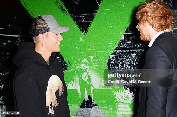 Justin Bieber and Ed Sheeran attend the World Premiere of "Ed Sheeran: Jumpers For Goalposts" at Odeon Leicester Square on October 22, 2015 in...