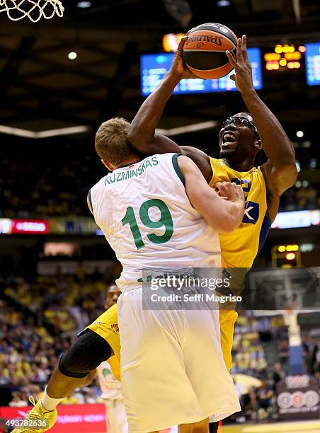 Trevor Mbakwe, #32 of Maccabi Fox Tel Aviv competes with Mindaugas Kuzminskas, #19 of Unicaja Malaga during the Turkish Airlines Euroleague Regular...