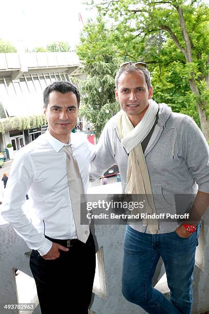 Journalists Laurent Luyat and Louis Laforge attend the French Open 2014 : Day 1 at Roland Garros on May 25, 2014 in Paris, France.