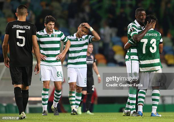 Sporting CP's midfielder William Carvalho celebrates with teammate forward Matheus Pereira during the UEFA Europa League match between Sporting CP...