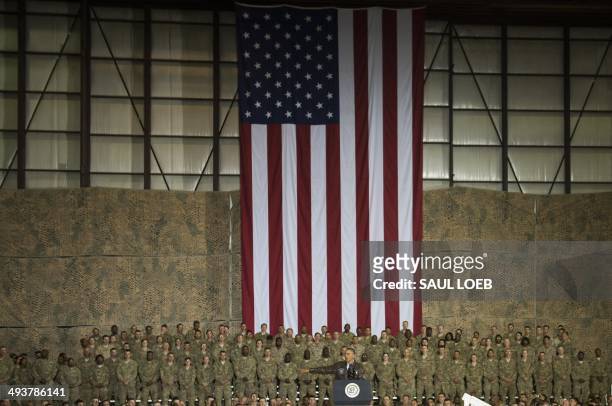 President Barack Obama speaks to US troops during a surprise visit toBagram Air Field, north of Kabul, in Afghanistan, May 25 prior to the Memorial...