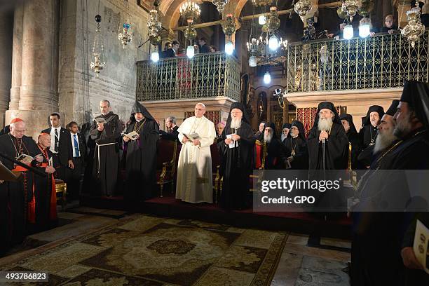 In this handout provided by the Israeli Government Press Office , Pope Francis prays at the Church of the Holy Sepulchre on May 25, 2014 in...