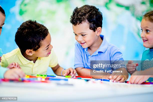 elementary students playing with blocks - day 1 stock pictures, royalty-free photos & images