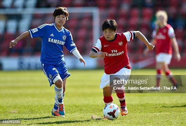 Shinobu Ohno of Arsenal and Ji So-Yun of Cheslea in action during The FA Women's Cup Semi Final between Chelsea Ladies and Arsenal Ladies at...