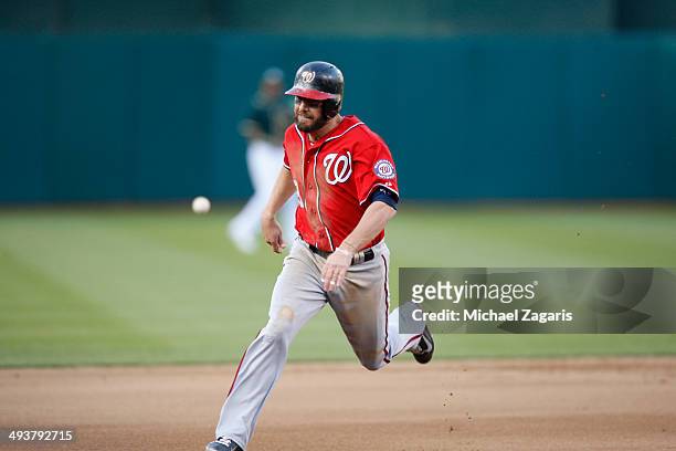 Kevin Frandsen of the Washington Nationals runs the bases during the game against the Oakland Athletics at O.co Coliseum on May 10, 2014 in Oakland,...