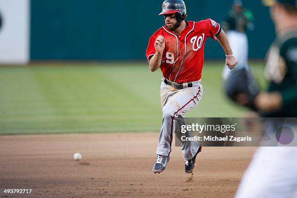 Kevin Frandsen of the Washington Nationals runs the bases during the game against the Oakland Athletics at O.co Coliseum on May 10, 2014 in Oakland,...