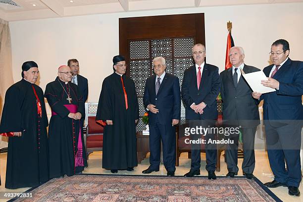 Bechara Boutros al-Rahi, 77th Maronite Patriarch of Antioch meets with the Palestinian President Mahmoud Abbas in Ramallah on May 25, 2014.