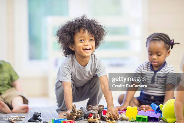 happy children playing together - boy floor stockfoto's en -beelden