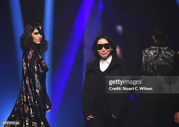 Michael Cinco walks the runway after his show during Dubai Fashion Forward Spring/Summer 2016 at Madinat Jumeirah on October 22, 2015 in Dubai,...