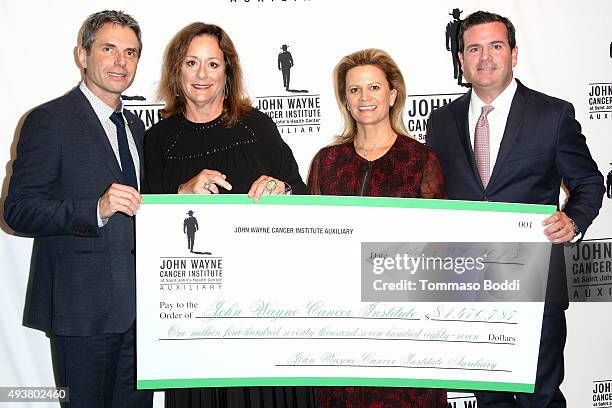 Dr. Anton Bilchik, John Wayne Cancer Institute Auxiliary President Anita Swift, Melanie Wayne and Michael Wayne attend the John Wayne Cancer...