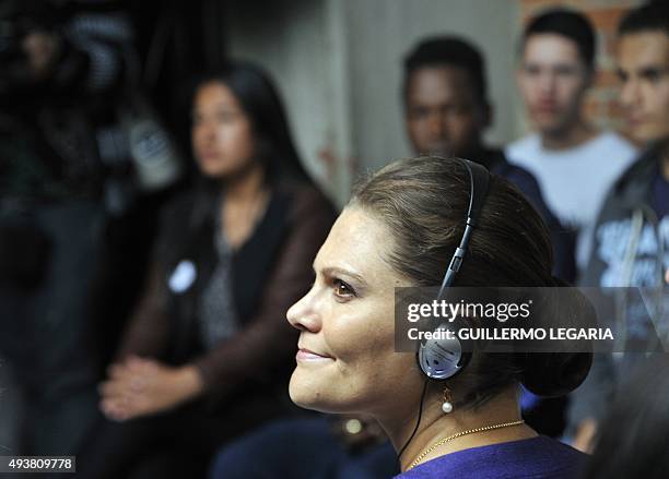 Crown Princess Victoria of Sweden smiles during a visit to the Ruta Motor project, a social program sponsored by the Swedish government to help...