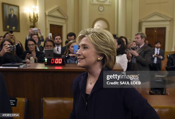 Former Secretary of State and Democratic Presidential hopeful Hillary Clinton leaves after she testified before the House Select Committee on...