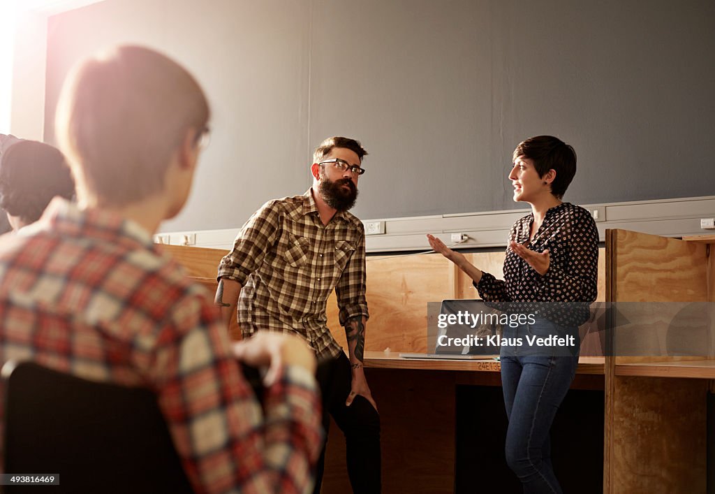 Creative business people having casual meeting