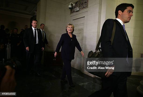 Democratic presidential candidate and former Secretary of State Hillary Clinton leaves after a hearing before the House Select Committee on Benghazi...