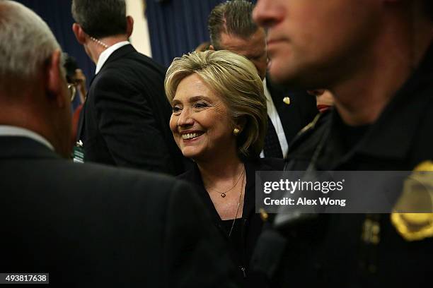 Democratic presidential candidate and former Secretary of State Hillary Clinton leaves after a hearing before the House Select Committee on Benghazi...