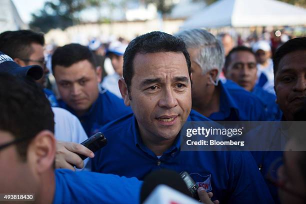 Presidential candidate Jimmy Morales, center, arrives at a campaign rally in Guatemala City, Guatemala, on Thursday, Oct. 22, 2015. Morales, an actor...