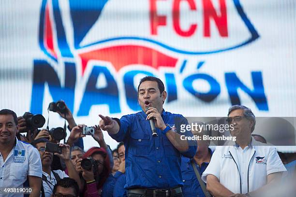 Presidential candidate Jimmy Morales, center, speaks at a campaign rally in Guatemala City, Guatemala, on Thursday, Oct. 22, 2015. Morales, an actor...