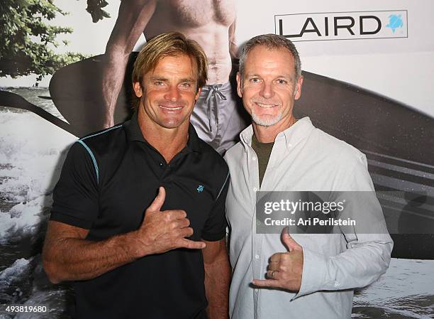 Professional surfer Laird Hamilton and President of Laird Apparel Tim Garret attend the launch of their clothing line Laird Apparel by Laird Hamilton...