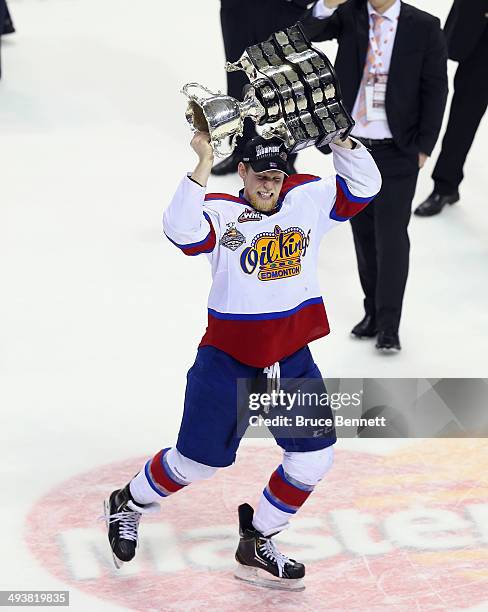 Henrik Samuelsson of the Edmonton Oil Kings skates with the Memorial Cup trophy following a 6-3 victory over the Guelph Storm in the 2014 Memorial...