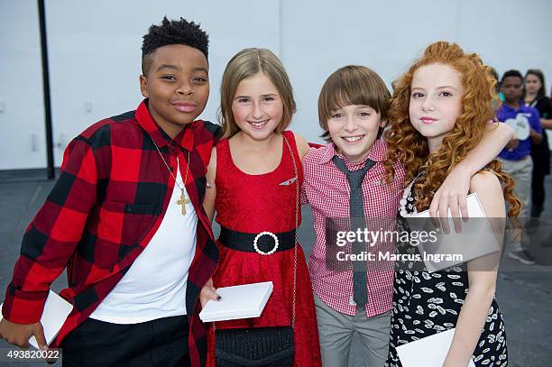 Mar Mar, Hadley Belle Miller, Noah Schnapp, and Francesca Capaldi attend 'Snoopy' and Co. Receiving his Pilot's 'Wings' ceremony at Delta flight...