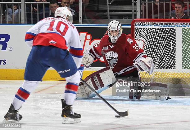 Henrik Samuelsson of the Edmonton Oil Kings moves in to beat Justin Nichols of the Guelph Storm during the final of the 2014 MasterCard Memorial Cup...