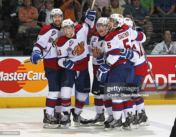 Henrik Samuelsson of the Edmonton Oil Kings celebrates his late empty net goal against the Guelph Storm during the final of the 2014 MasterCard...