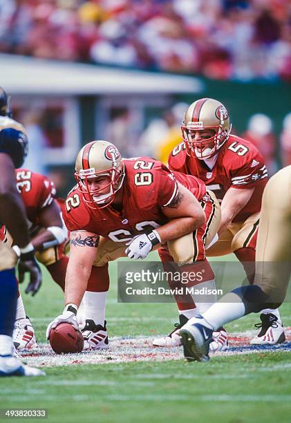 Jeremy Newberry of the San Francisco 49ers centers the ball to quarterback Jeff Garcia during a National Football League game against the St. Louis...