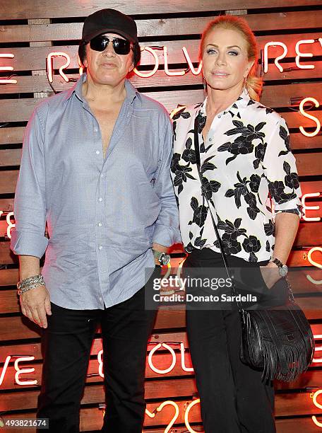 Musician Gene Simmons and Shannon Tweed attend the REVOLVE fashion show benefiting Stand Up To Cancer on October 22, 2015 in Los Angeles, California.