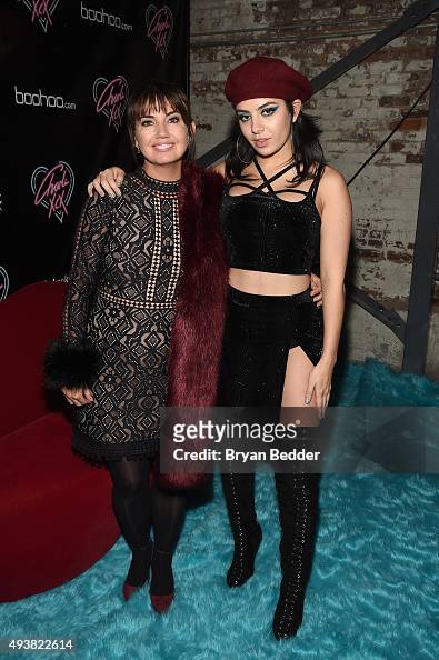 CEO of Boohoo, Carol Kane and singer-songwriter Charli XCX attend the ...